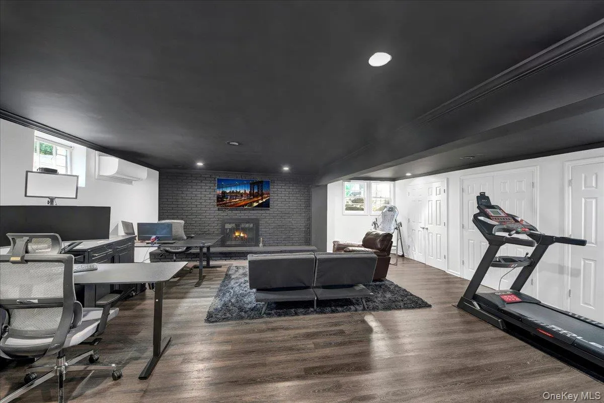 Completely updated and finished basement area with fireplace and half bathroom Completely updated and finished basement area with fireplace and half bathroom