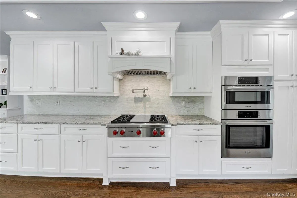 Eat-in Kitchen with granite countertops and stainless steel appliances Eat-in Kitchen with granite countertops and stainless steel appliances