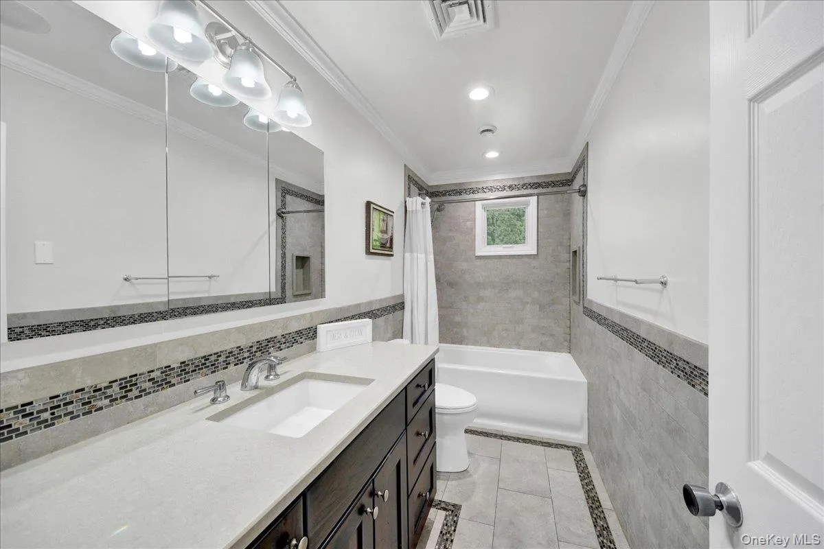 Main hall full bathroom Main hall full bathroom