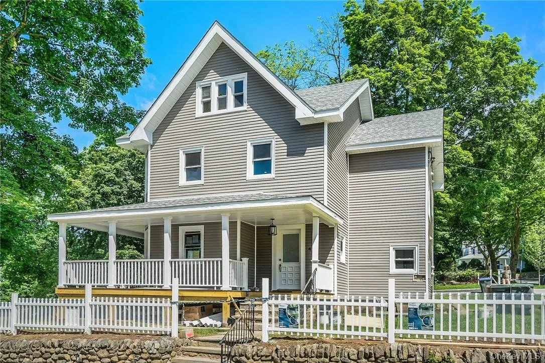 View of front facade featuring a porch View of front facade featuring a porch