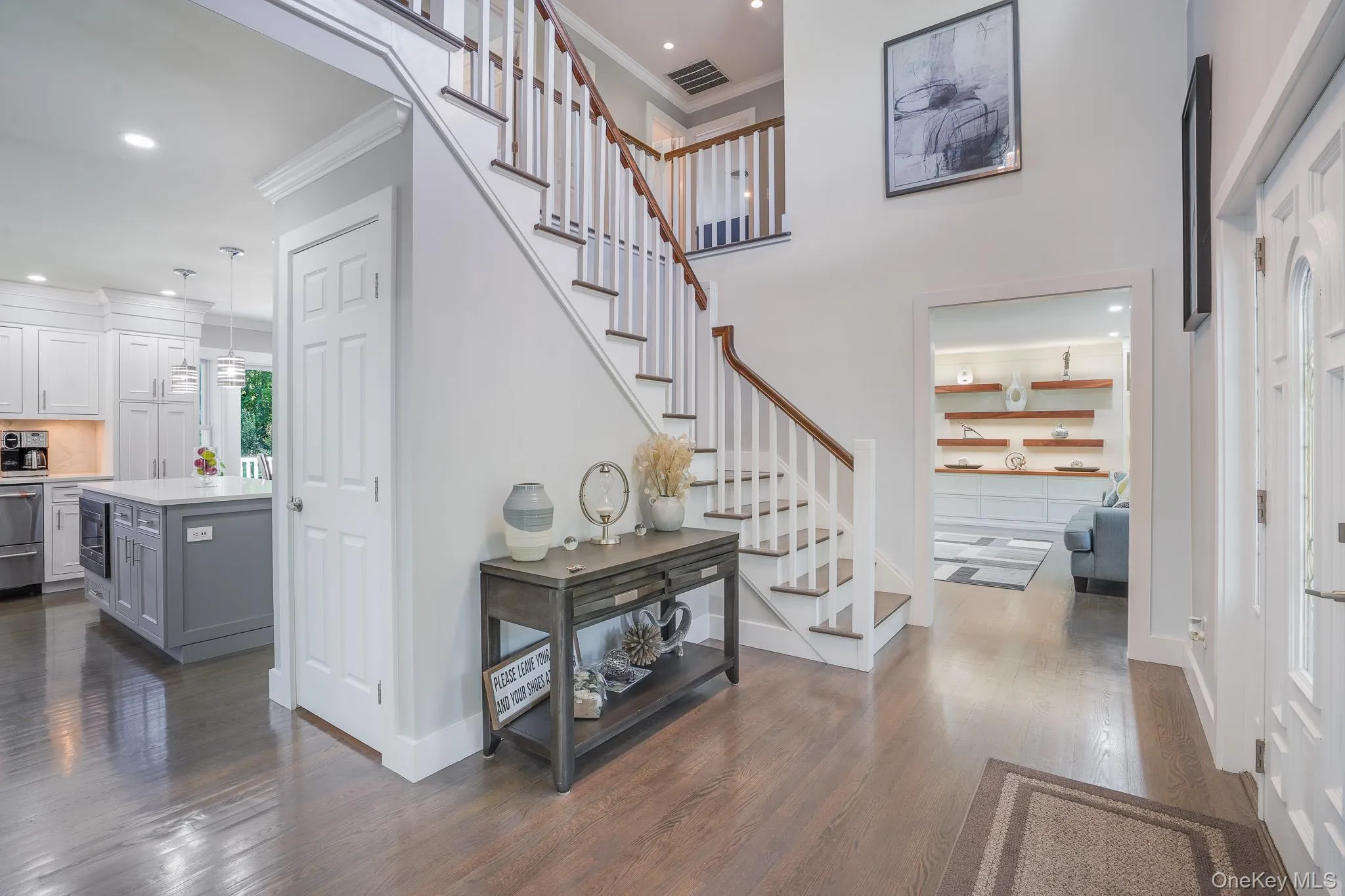 Entry foyer with high ceilings. Entry foyer with high ceilings.