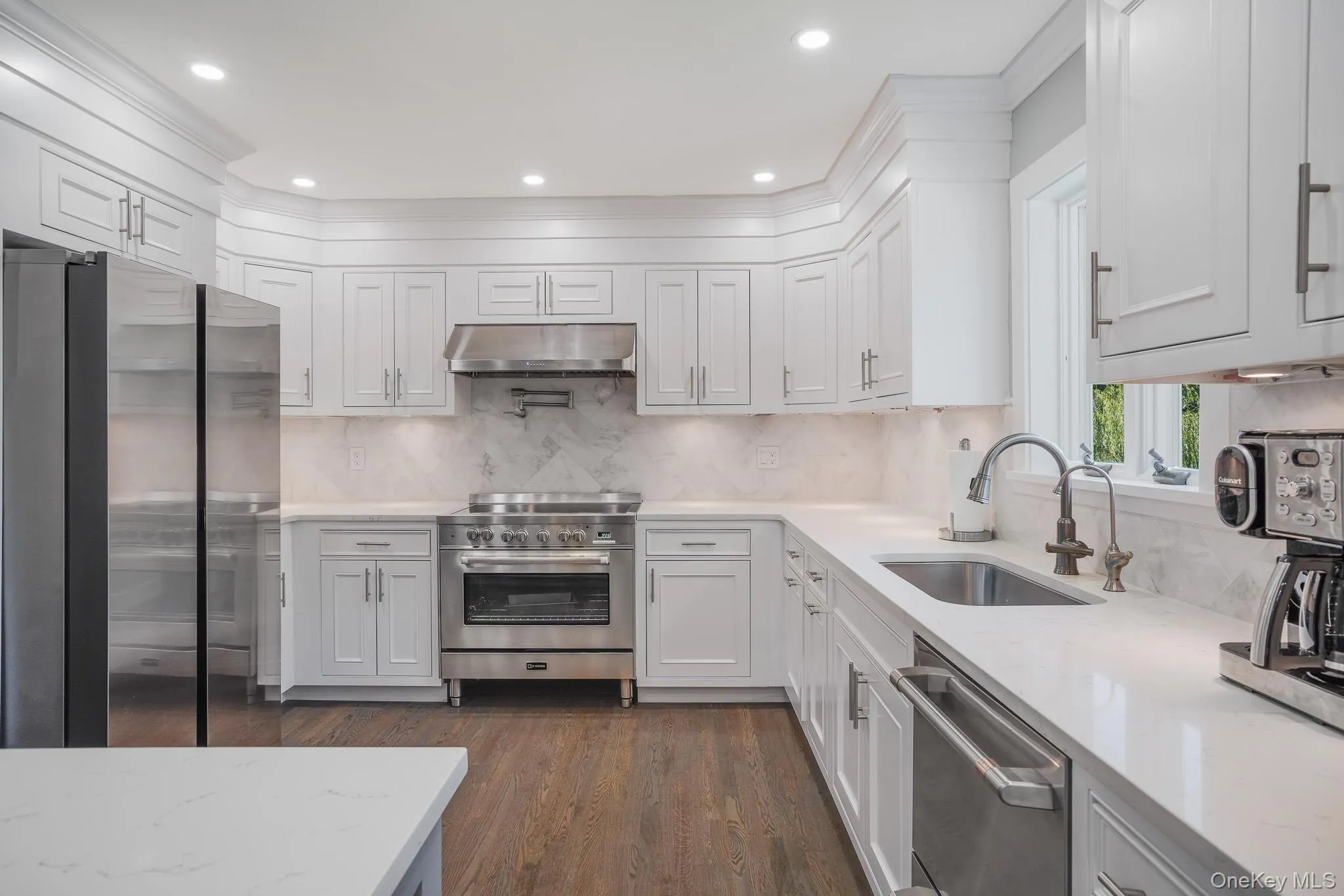 Stainless steel appliances, quartz, counter tops and custom cabinets. Stainless steel appliances, quartz, counter tops and custom cabinets.