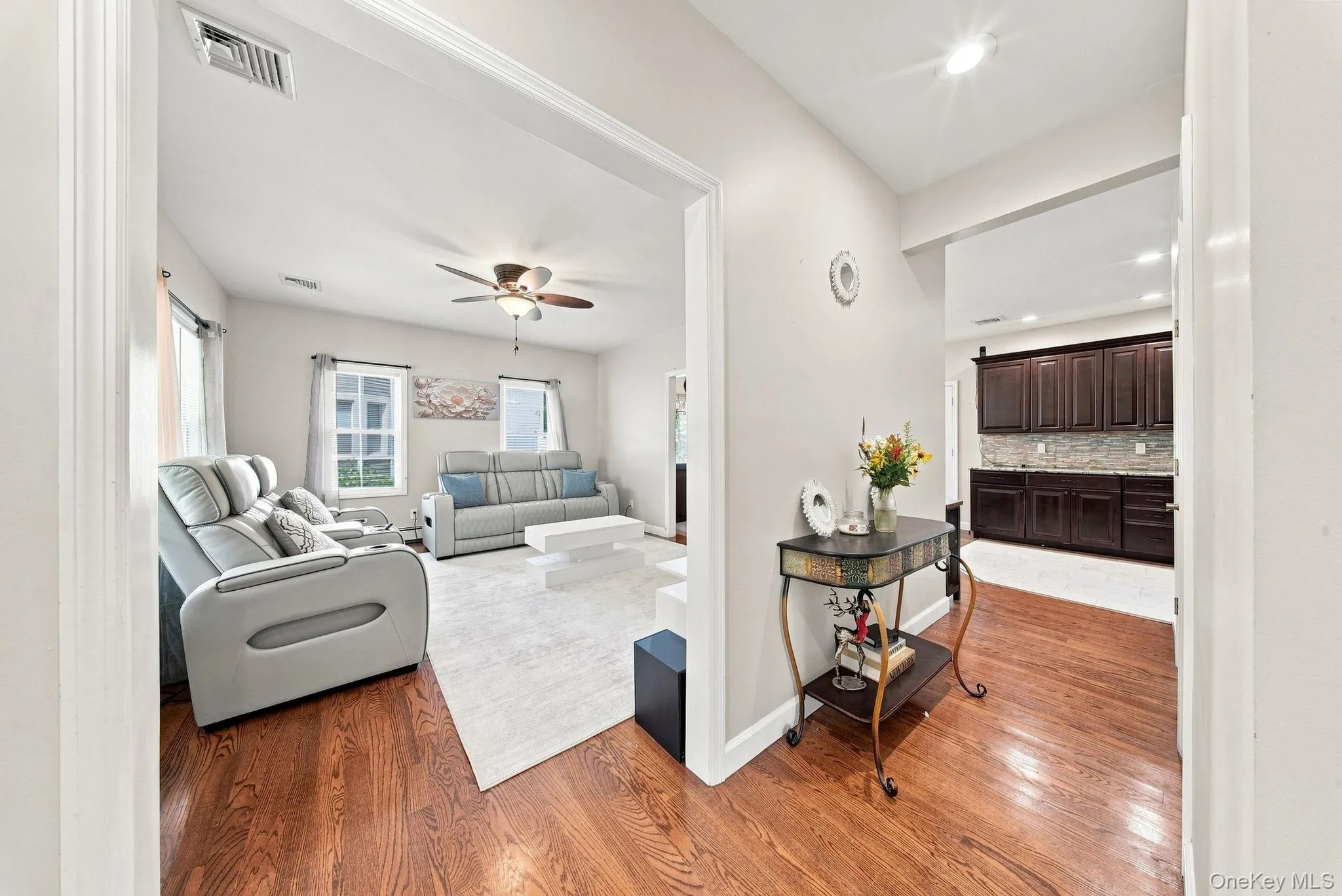 Foyer featuring hardwood floors and recessed lighting. Foyer featuring hardwood floors and recessed lighting.
