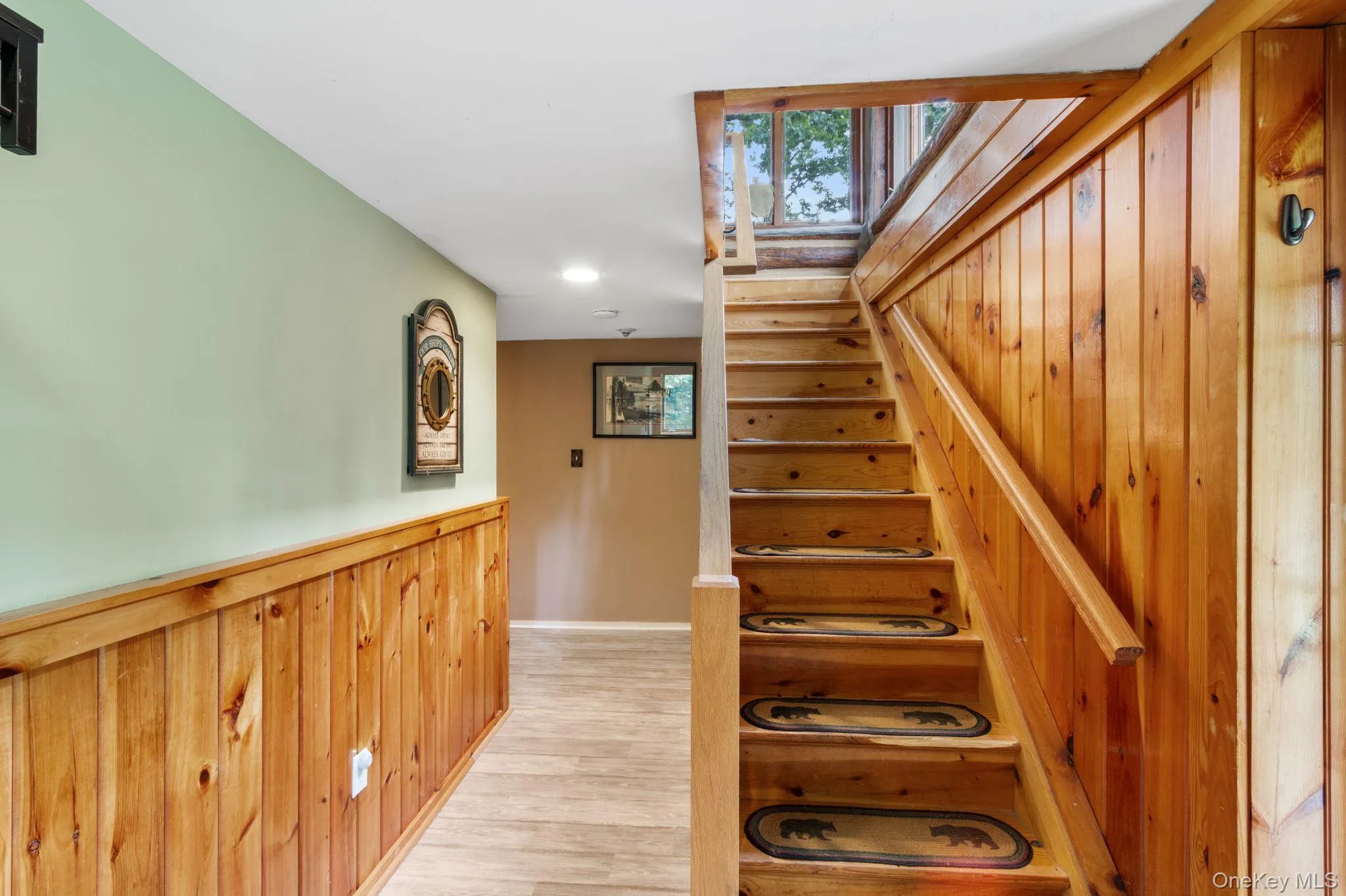 Spacious and welcoming foyer with plenty of room to sit down, take off your shoes, and drop your bags. Spacious and welcoming foyer with plenty of room to sit down, take off your shoes, and drop your bags.