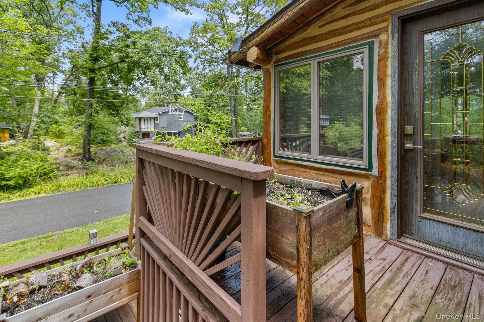 Views from the second-floor entry overlooking peaceful Cliff Road. Views from the second-floor entry overlooking peaceful Cliff Road.