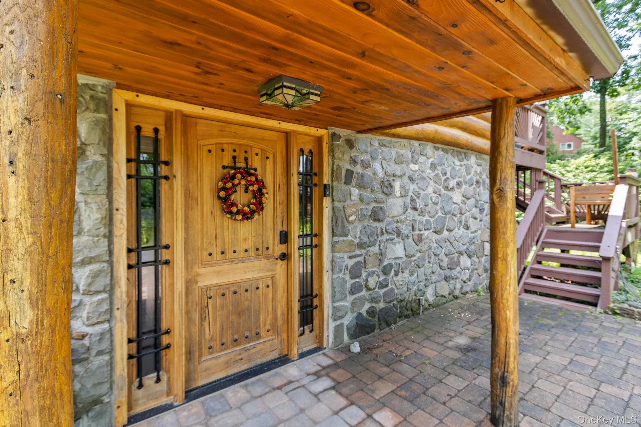 Convenient entrance located just steps from the driveway. Convenient entrance located just steps from the driveway.