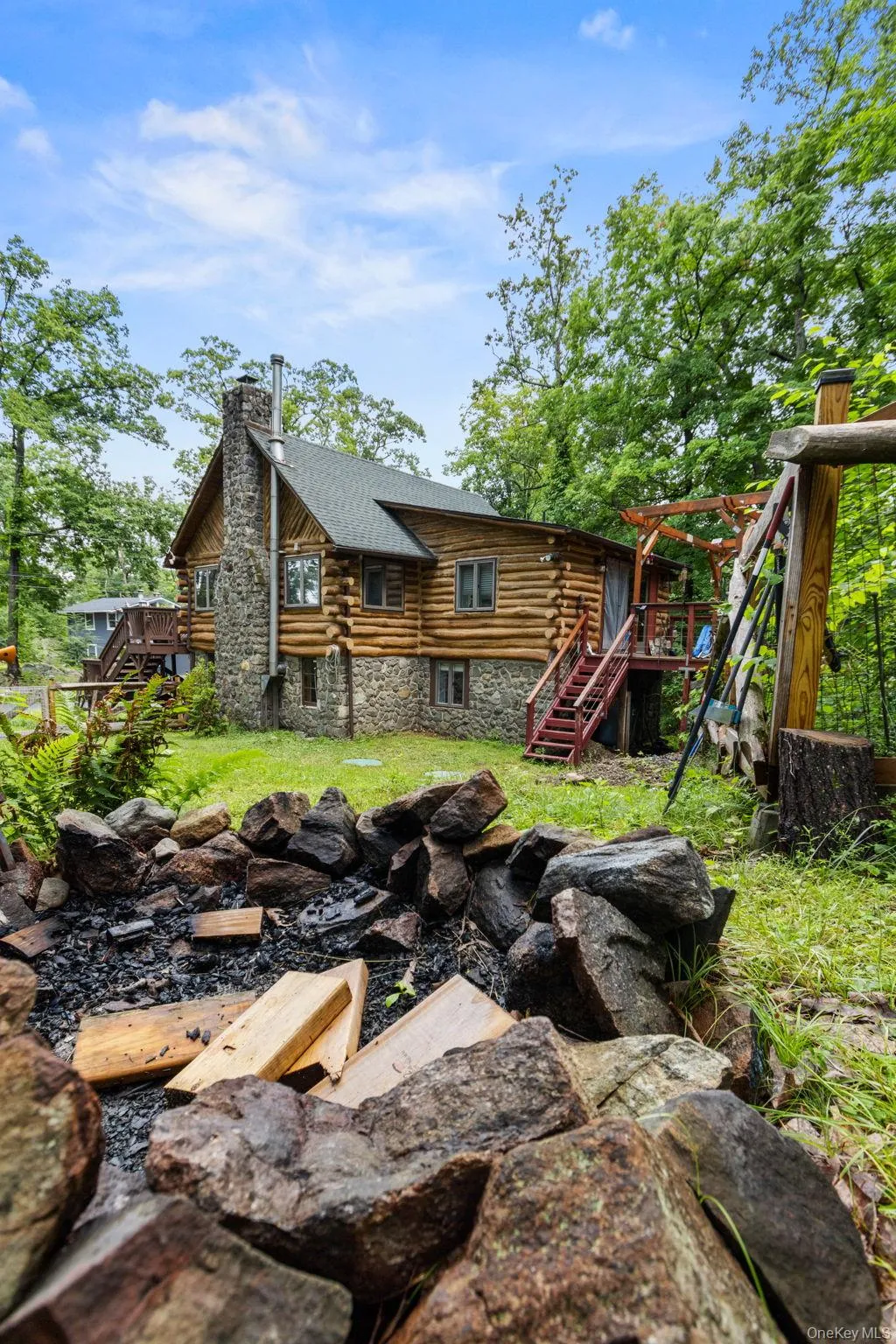 Private, fenced-in side yard with plenty of space for a fire pit and outdoor gatherings. Private, fenced-in side yard with plenty of space for a fire pit and outdoor gatherings.