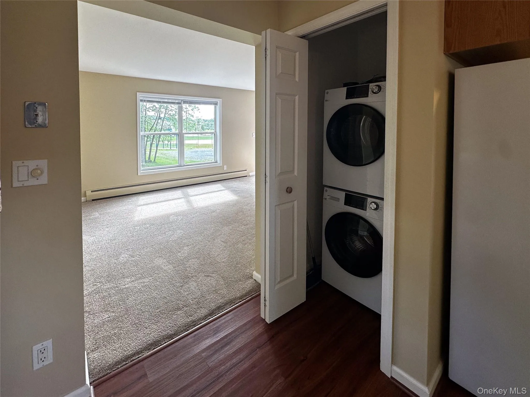 This angle shows how the kitchen and pantry/laundry is located just off of the family room. This angle shows how the kitchen and pantry/laundry is located just off of the family room.