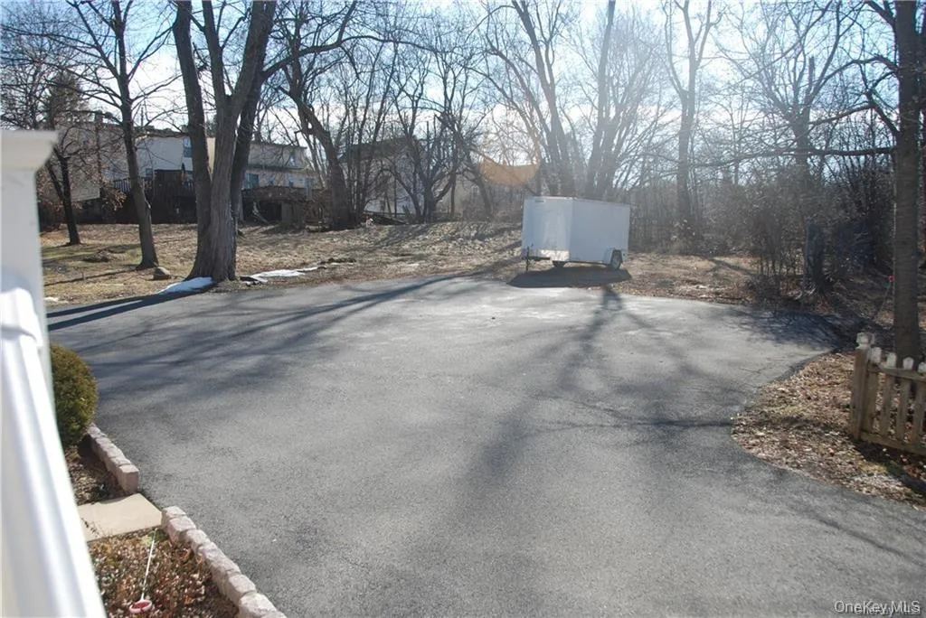 Plenty of space for 4 cars (2 for each unit). Additional guests may park just next door at the park. Plenty of space for 4 cars (2 for each unit). Additional guests may park just next door at the park.