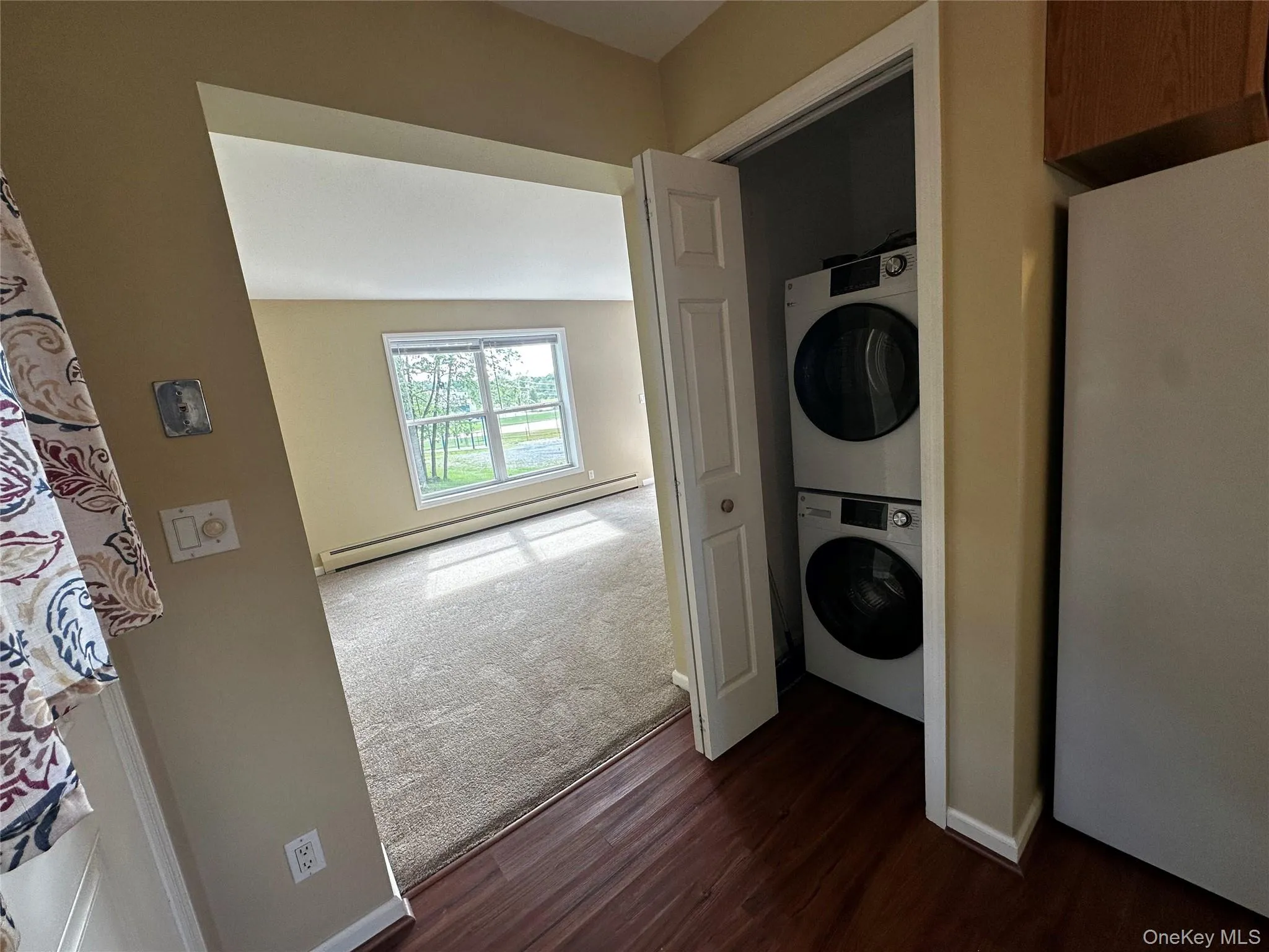 This angle shows how the kitchen and pantry/laundry is located just off of the family room. This angle shows how the kitchen and pantry/laundry is located just off of the family room.