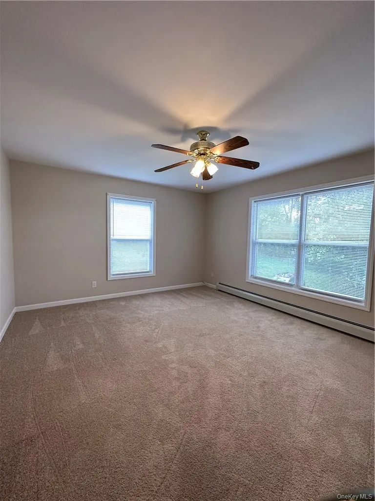 Second bedroom also boasts plush carpeting, fresh paint and a large closet! Second bedroom also boasts plush carpeting, fresh paint and a large closet!