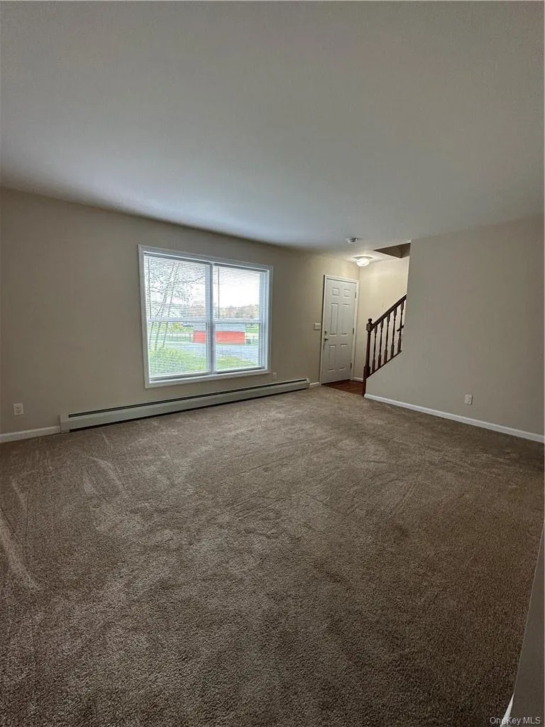 Family room is generous in size and bright with large windows. Not only do the windows let in much natural light, but they provide a refreshing cross breeze in warmer seasons keeping the home naturally cool. The home is updated and well insulated for colder months. Family room is generous in size and bright with large windows. Not only do the windows let in much natural light, but they provide a refreshing cross breeze in warmer seasons keeping the home naturally cool. The home is updated and well insulated for colder months.