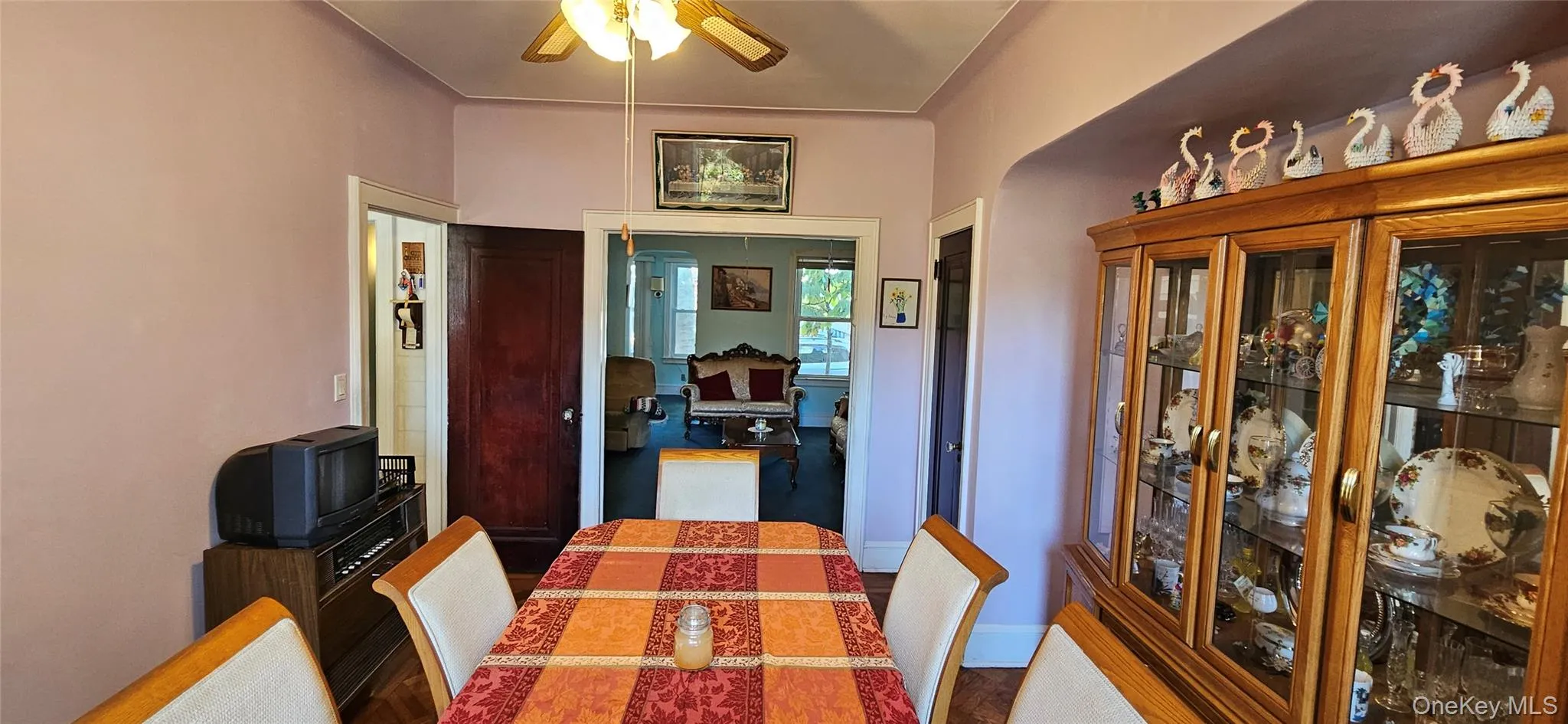 Dining room featuring a ceiling fan and baseboards Dining room featuring a ceiling fan and baseboards