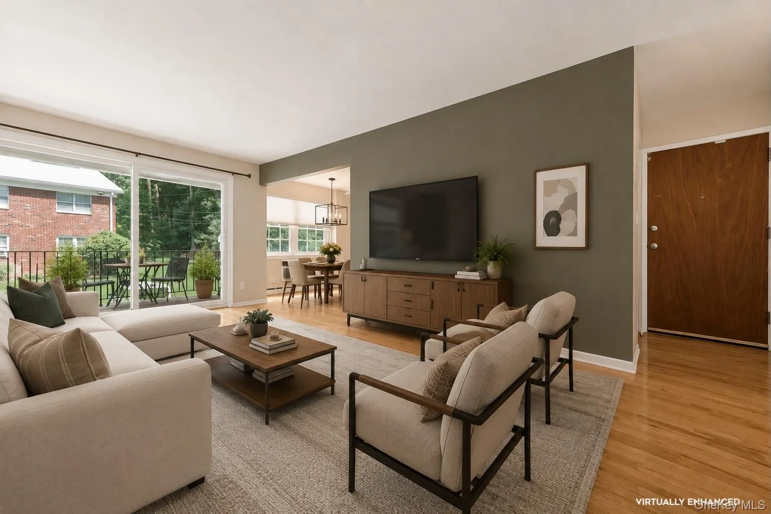 We've reimagined the living room with an accent wall. Love the color? It's Sherwin Williams Taiga. Everything else? Just cool new furnishings! We've reimagined the living room with an accent wall. Love the color? It's Sherwin Williams Taiga. Everything else? Just cool new furnishings!