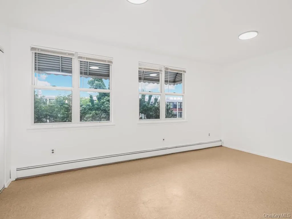 Primary bedroom on second floor with lots of closet space. Photo may be AI Edited Primary bedroom on second floor with lots of closet space. Photo may be AI Edited