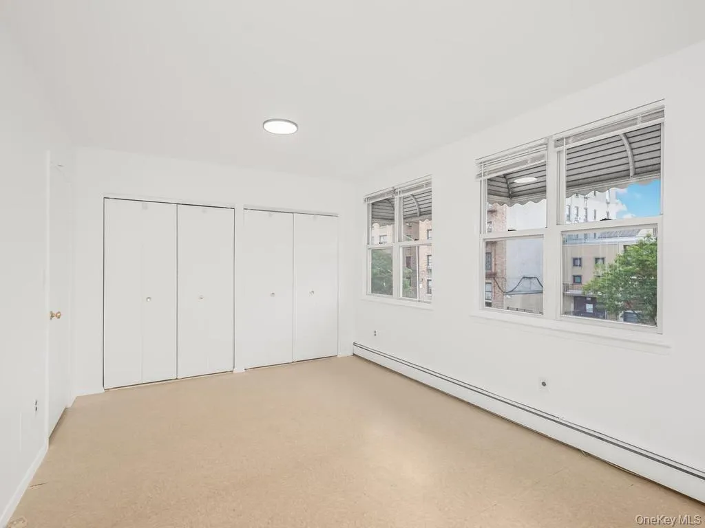 Primary Bedroom on second floor with lots of closet space. Photo may be AI Edited Primary Bedroom on second floor with lots of closet space. Photo may be AI Edited