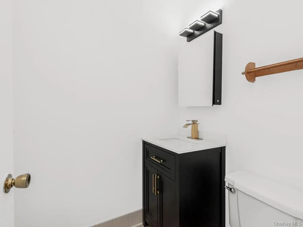 Guest Bath on First Floor. Photo may be AI Edited Guest Bath on First Floor. Photo may be AI Edited