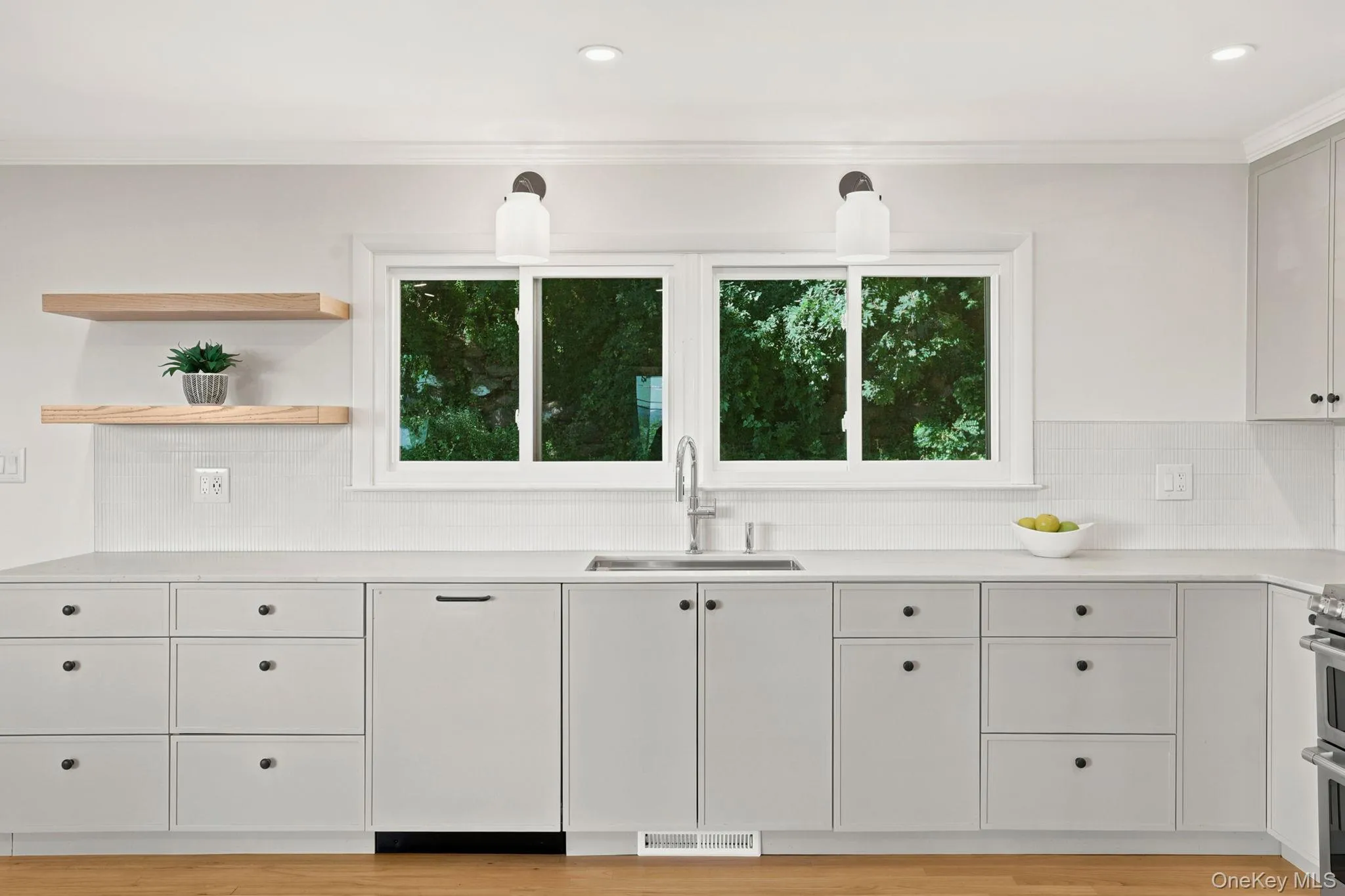 Renovated gorgeous kitchen with view of rear garden. Renovated gorgeous kitchen with view of rear garden.
