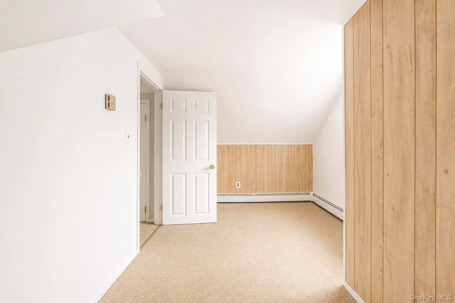 Bedroom #4 featuring beige carpet flooring and white walls Bedroom #4 featuring beige carpet flooring and white walls