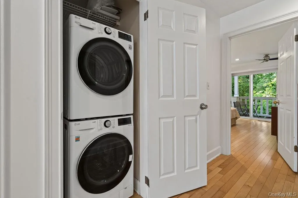 Full size washer and dryer in closet with standard door. Full size washer and dryer in closet with standard door.