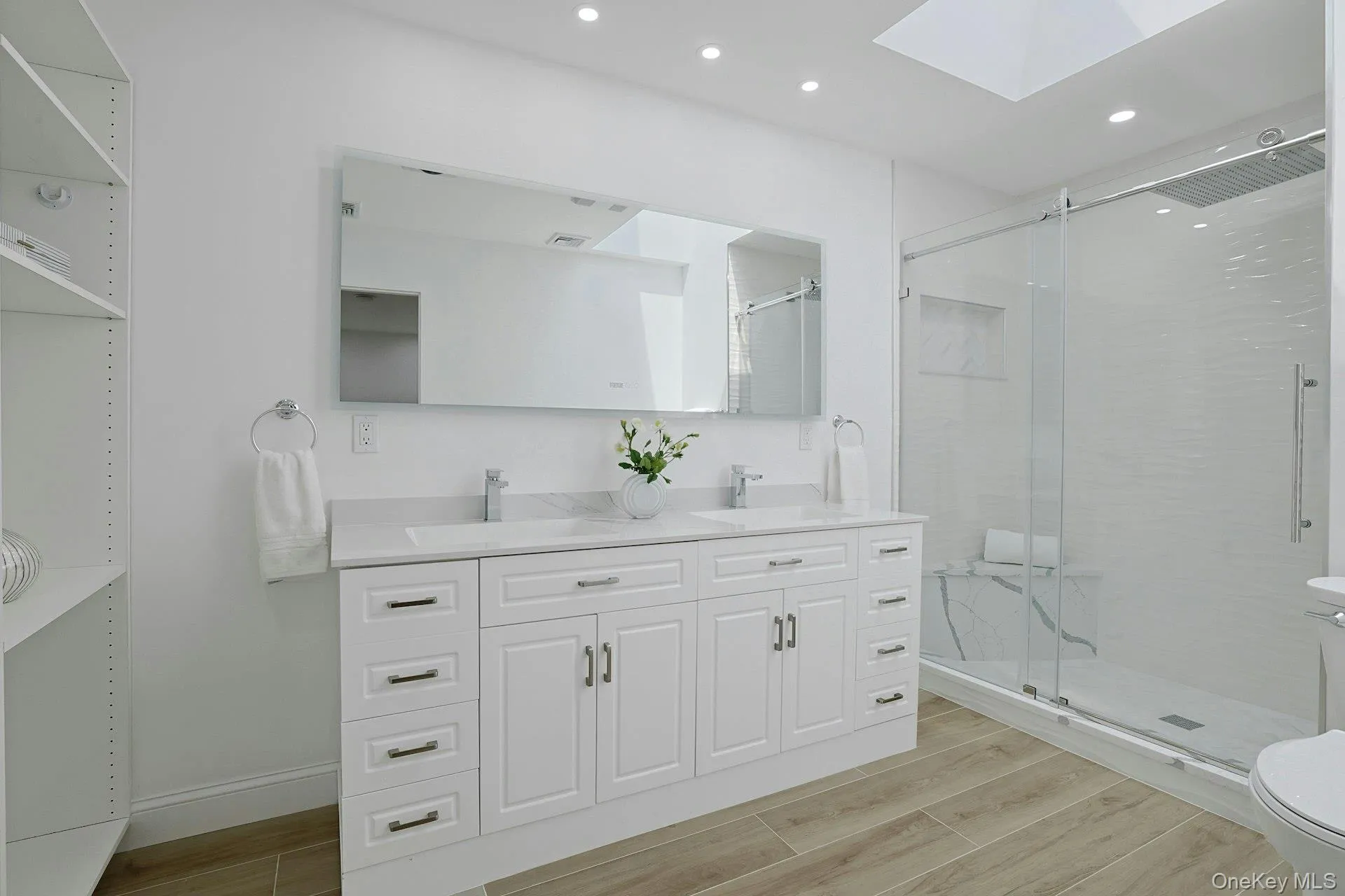 Double sinks, spa shower & skylights Double sinks, spa shower & skylights