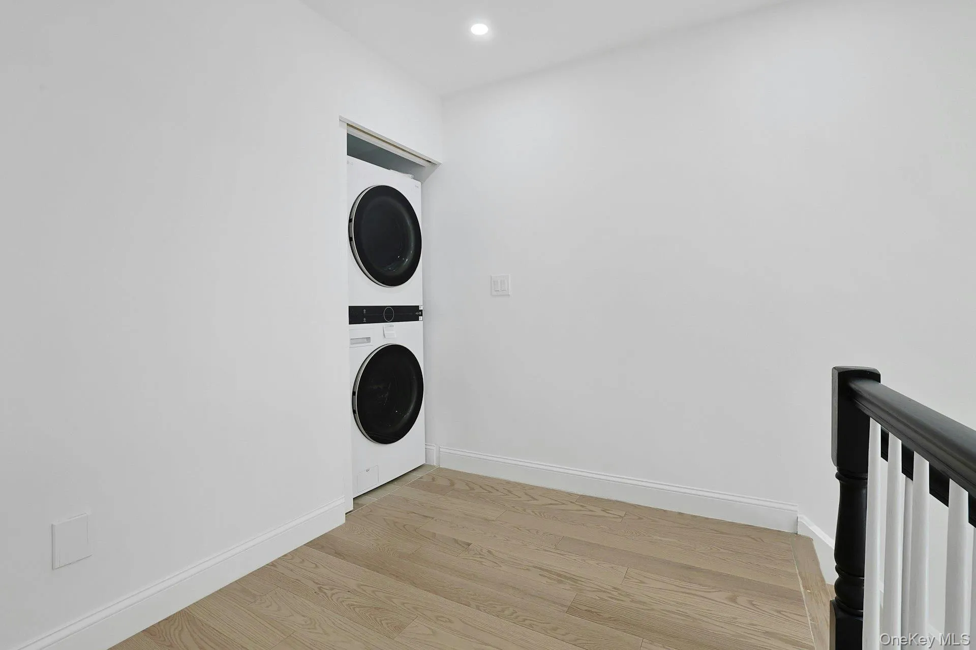 second floor landing with new LG washer & dryer-pocket doors second floor landing with new LG washer & dryer-pocket doors