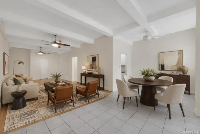 Staged Living Room/Dining Area Staged Living Room/Dining Area