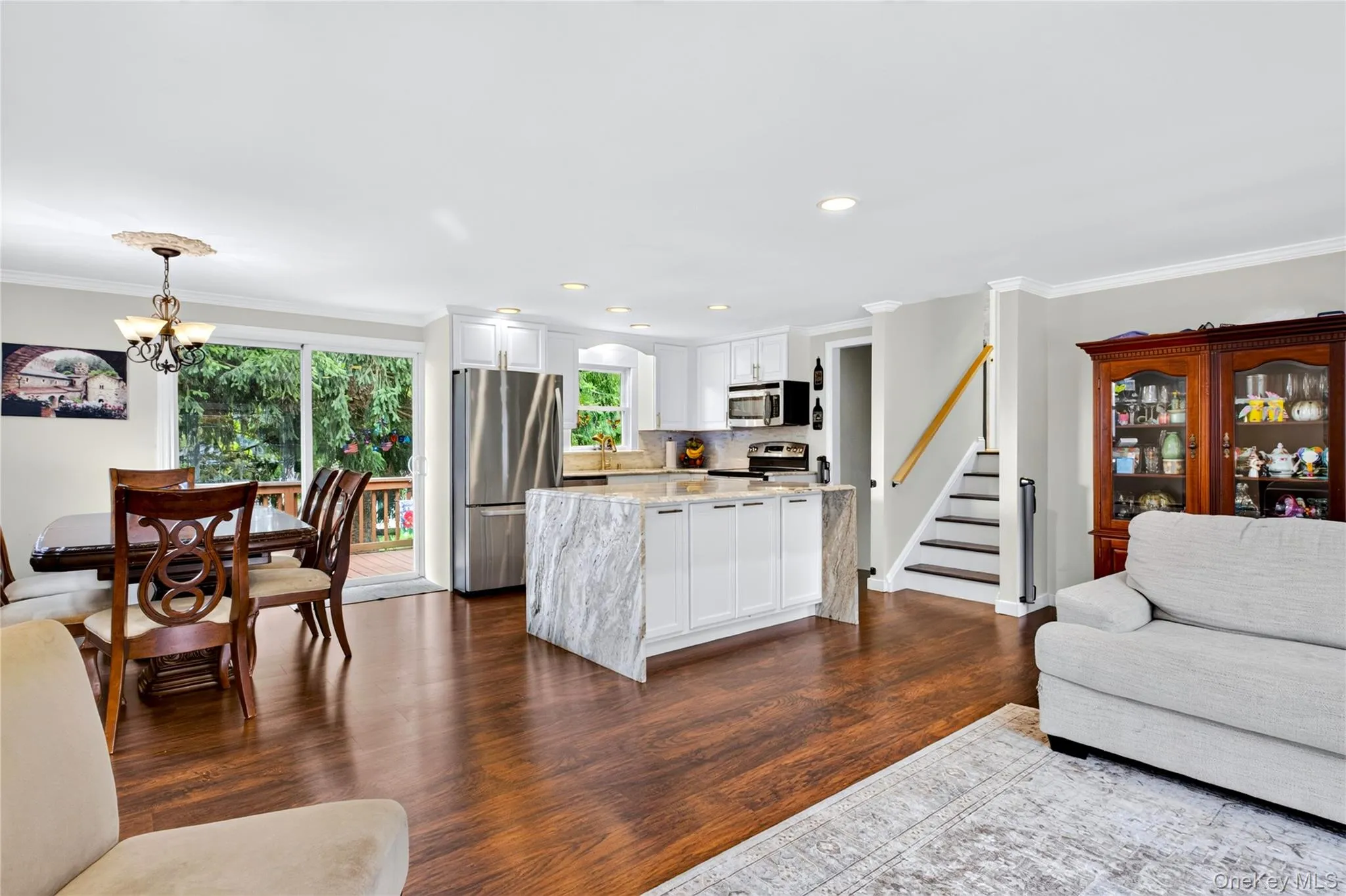 Open floor plan. Dinning room with sliding glass doors to deck. Open floor plan. Dinning room with sliding glass doors to deck.