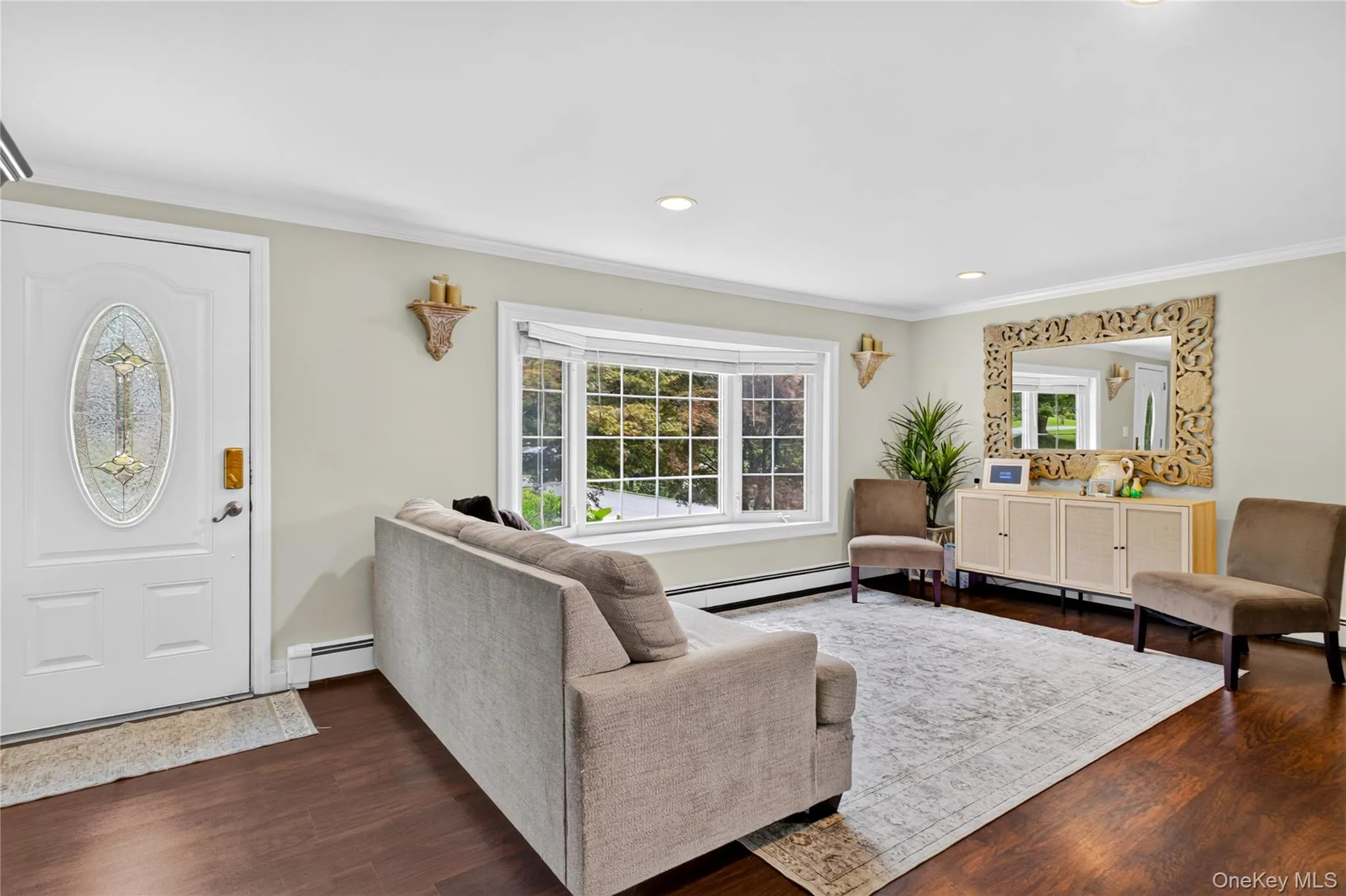 Living room with hardwood floors. Living room with hardwood floors.