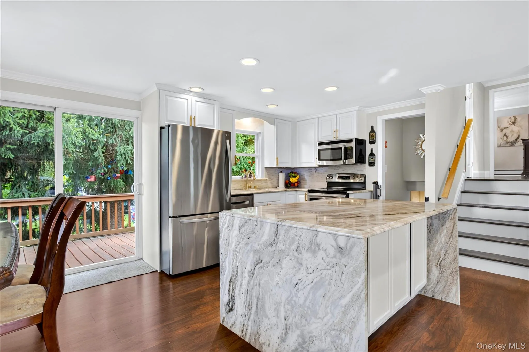 Newly redone kitchen with stainless appliances. Newly redone kitchen with stainless appliances.