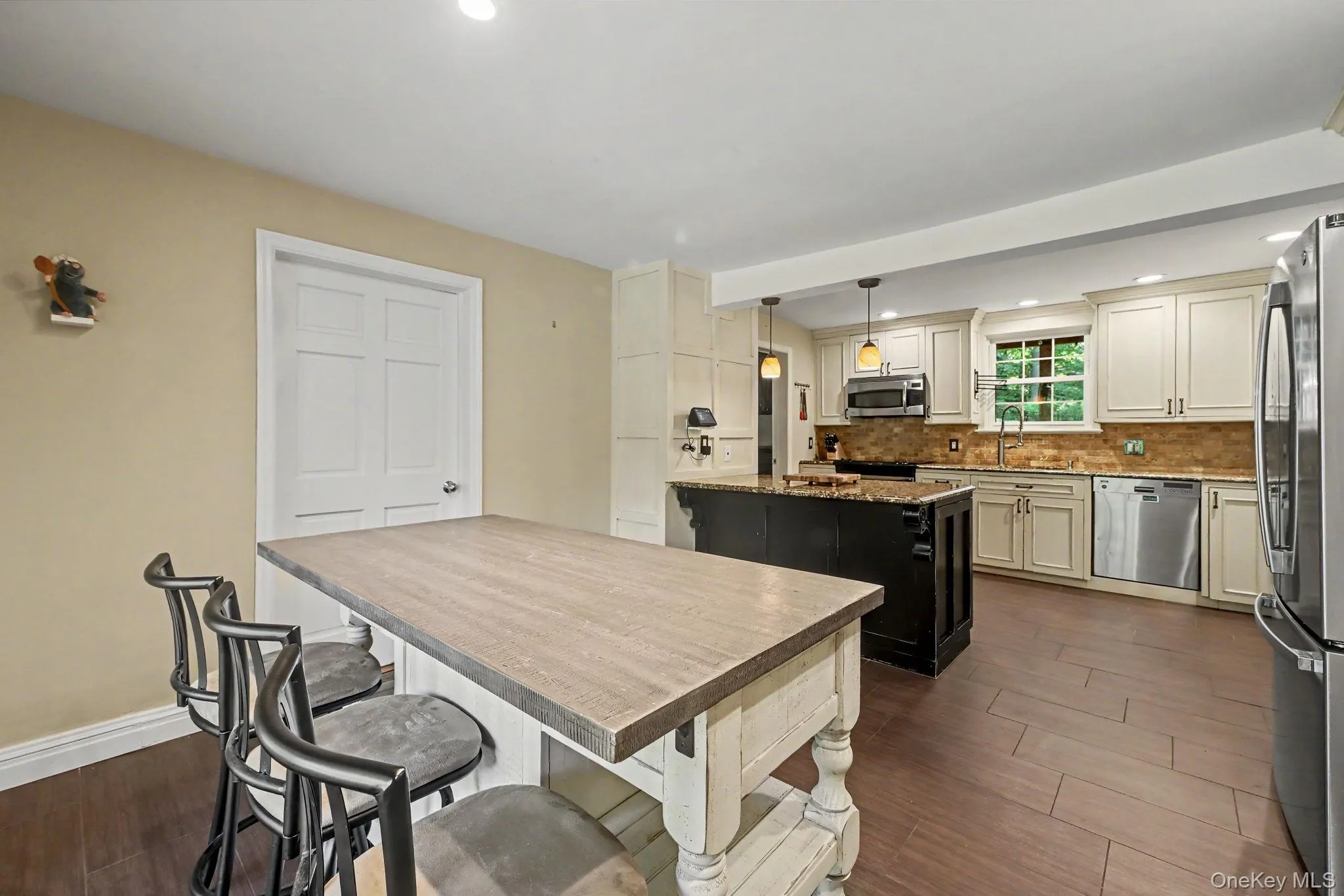 Large kitchen with door to family room. Large kitchen with door to family room.
