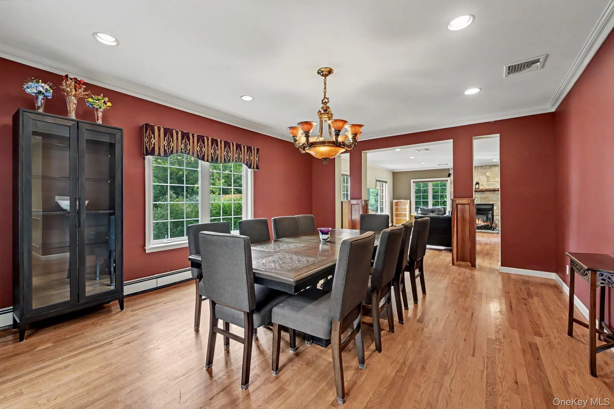 Dining room with opening to formal living room. Dining room with opening to formal living room.