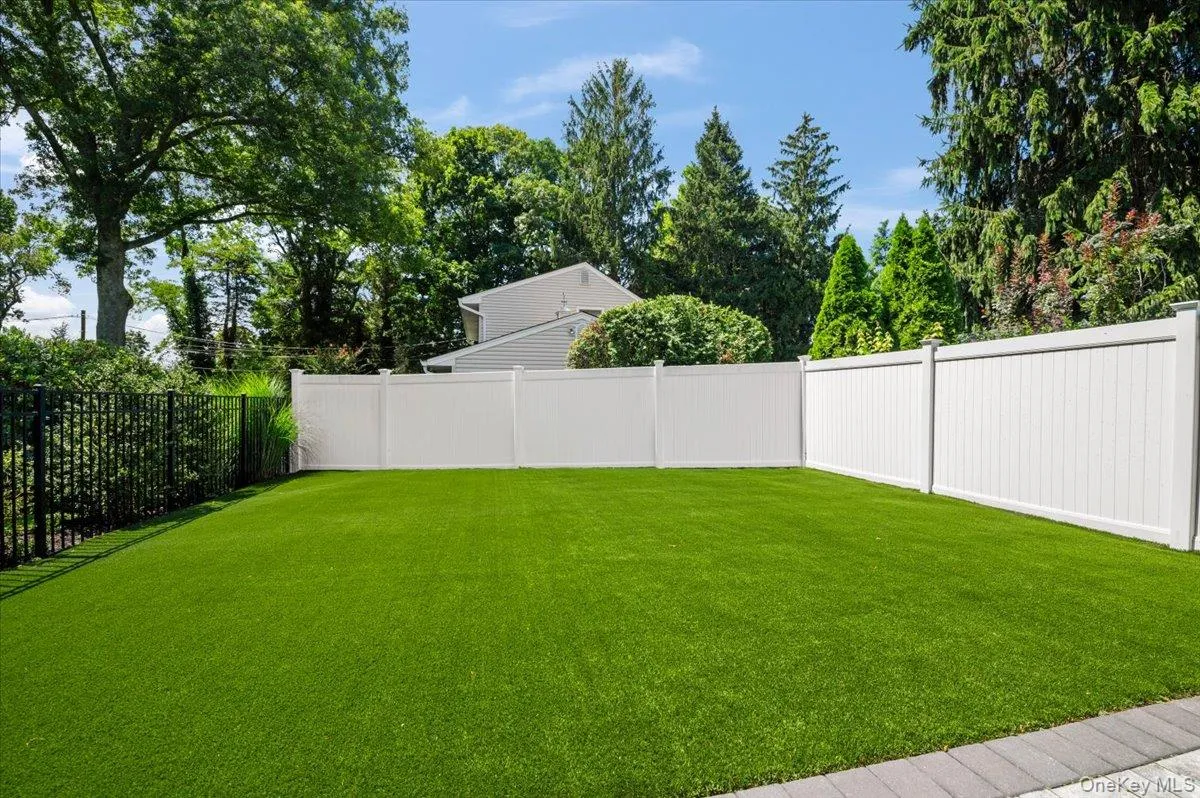 Turf side of yard. Turf side of yard.