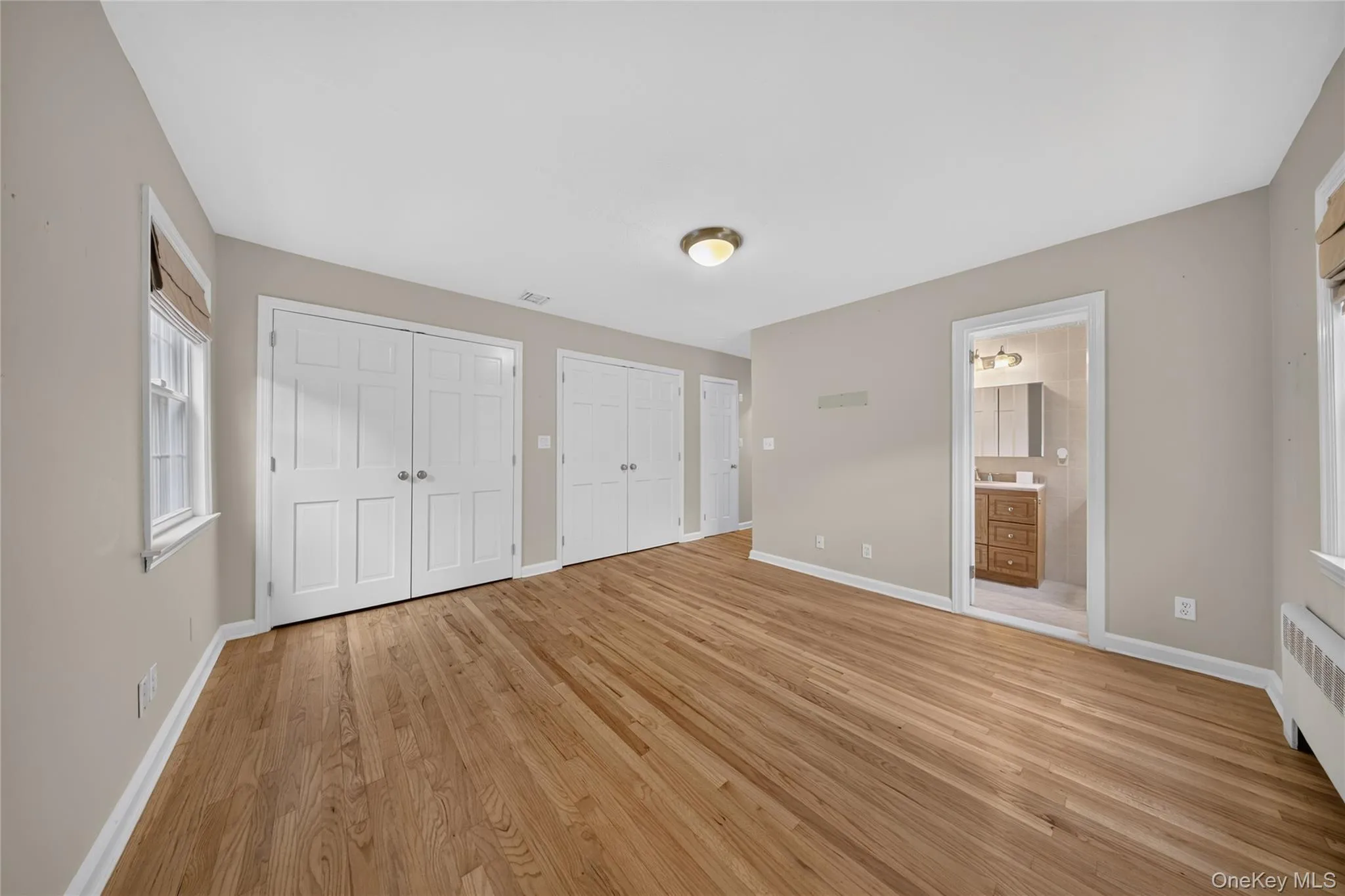 Hardwood flooring extending throughout the room Hardwood flooring extending throughout the room
