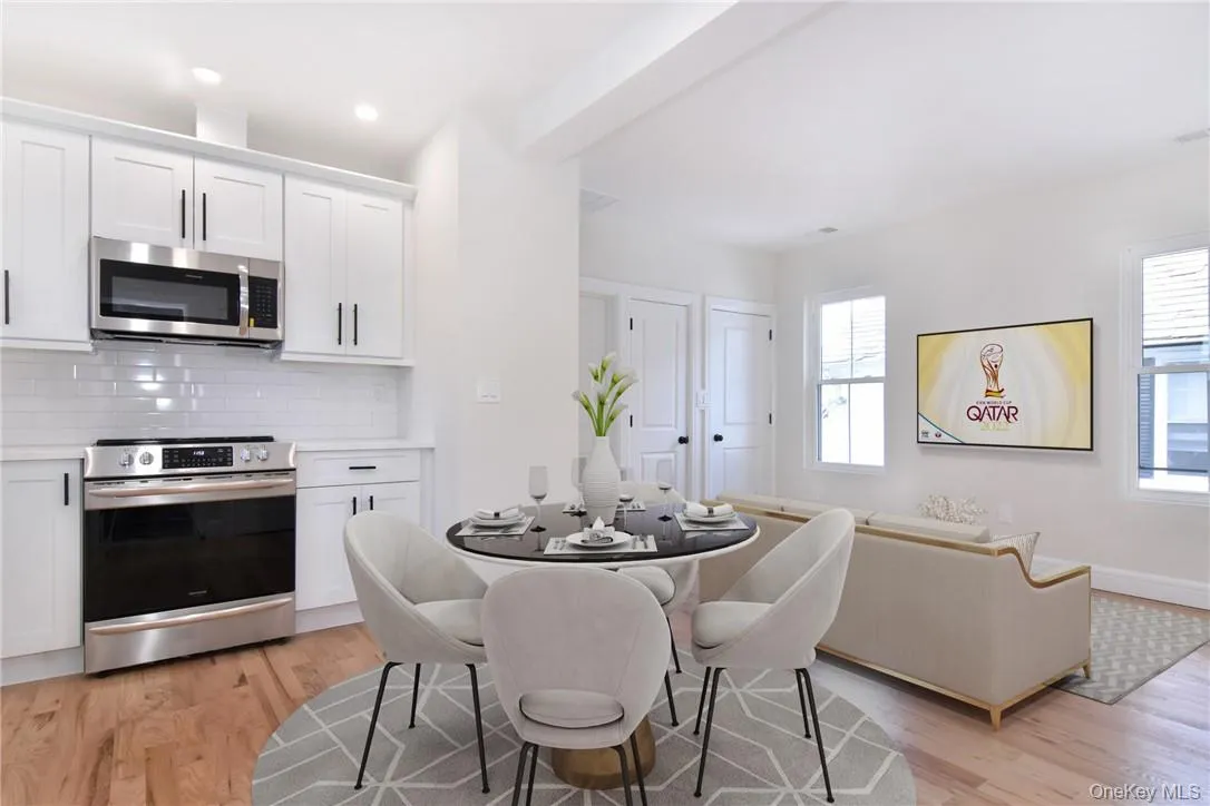 Furniture Virtually staged to show how furniture could be arranged. The kitchen and living room area are combined. Furniture Virtually staged to show how furniture could be arranged. The kitchen and living room area are combined.