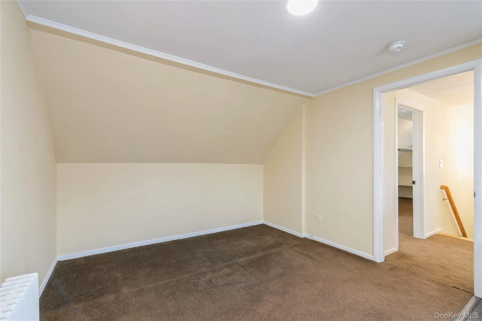 Cozy living room with soft carpeting and a versatile layout, offering a comfortable space to relax or entertain. Cozy living room with soft carpeting and a versatile layout, offering a comfortable space to relax or entertain.