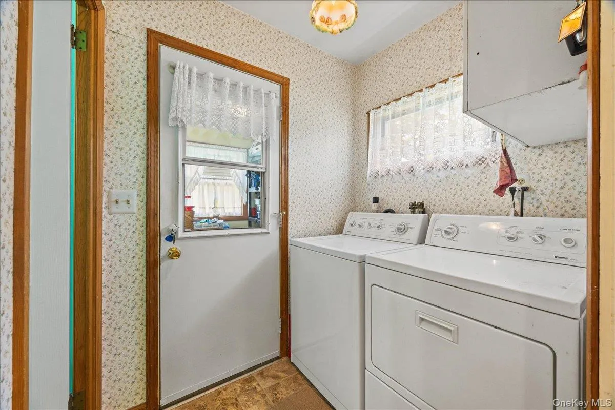 Main level laundry room. Main level laundry room.