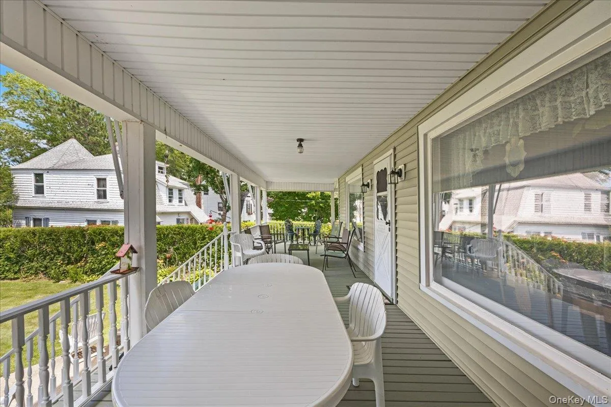 Wraparound porch is exceptional for a morning coffee overlooking the lake. Wraparound porch is exceptional for a morning coffee overlooking the lake.