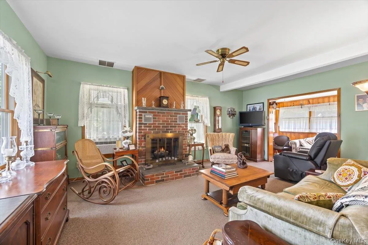 Cozy living room with wood burning fireplace. Cozy living room with wood burning fireplace.