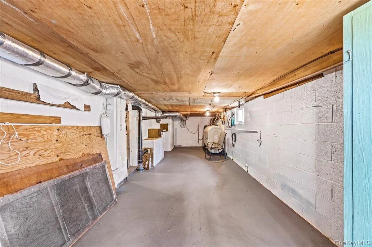 Double doors lead to this section of the basement, perfect for the lake toys! Double doors lead to this section of the basement, perfect for the lake toys!