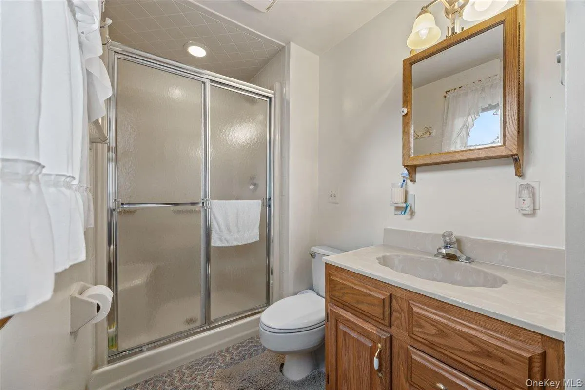 Primary bathroom features convenient step-in shower. Primary bathroom features convenient step-in shower.