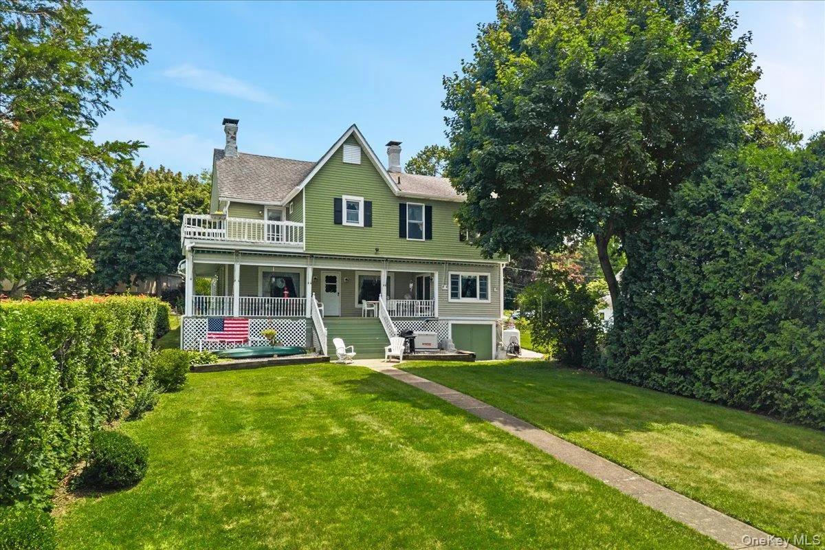 Enjoy the yard and the views from your wraparound porch and second level balcony. Enjoy the yard and the views from your wraparound porch and second level balcony.