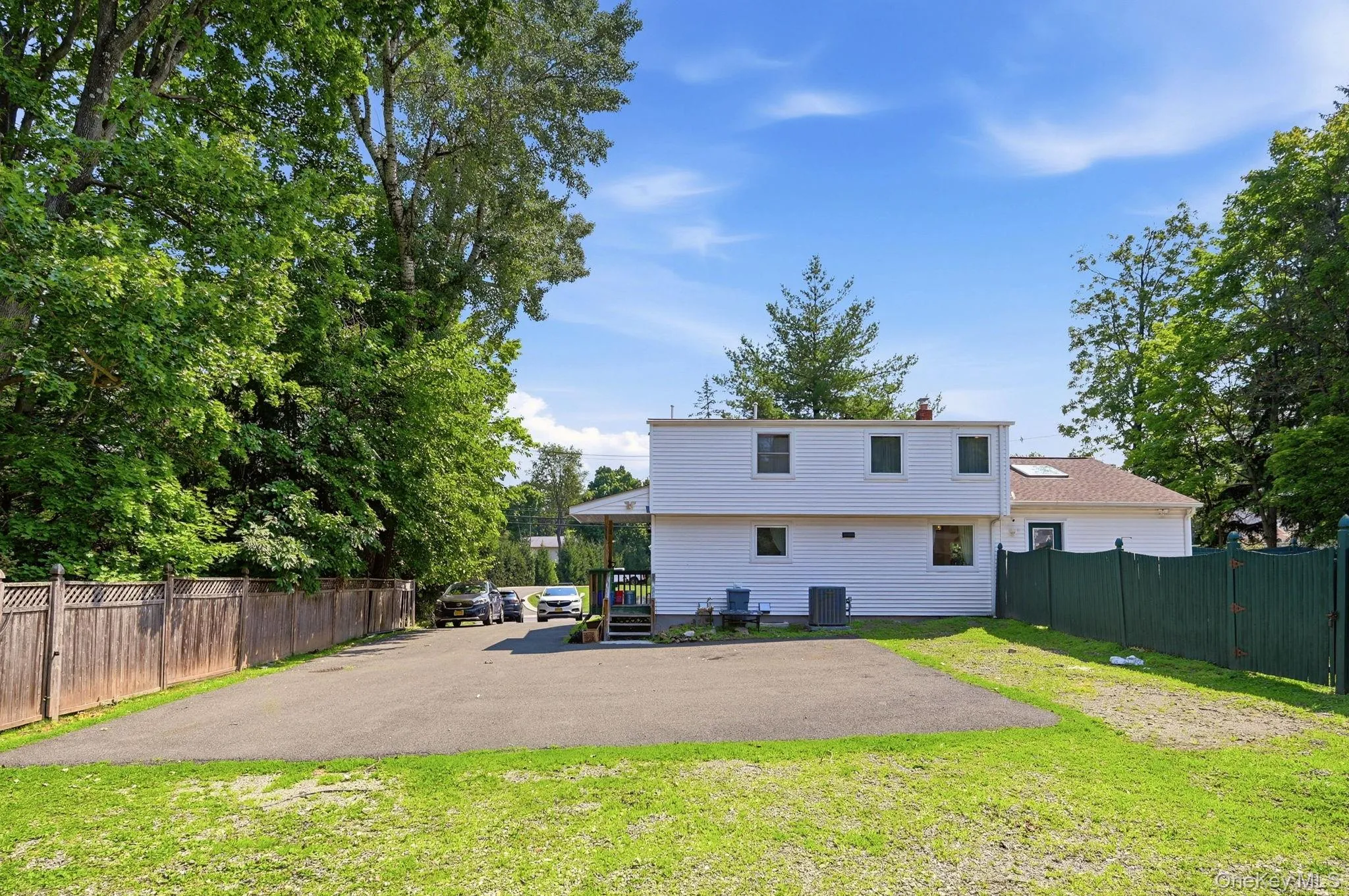 Large Parking Area Behind the Home. Large Parking Area Behind the Home.
