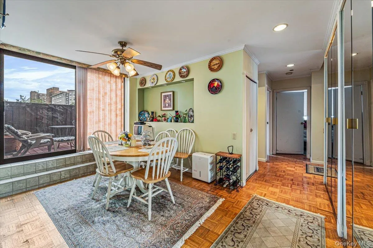 Dining area with sliding glass door to deck Dining area with sliding glass door to deck