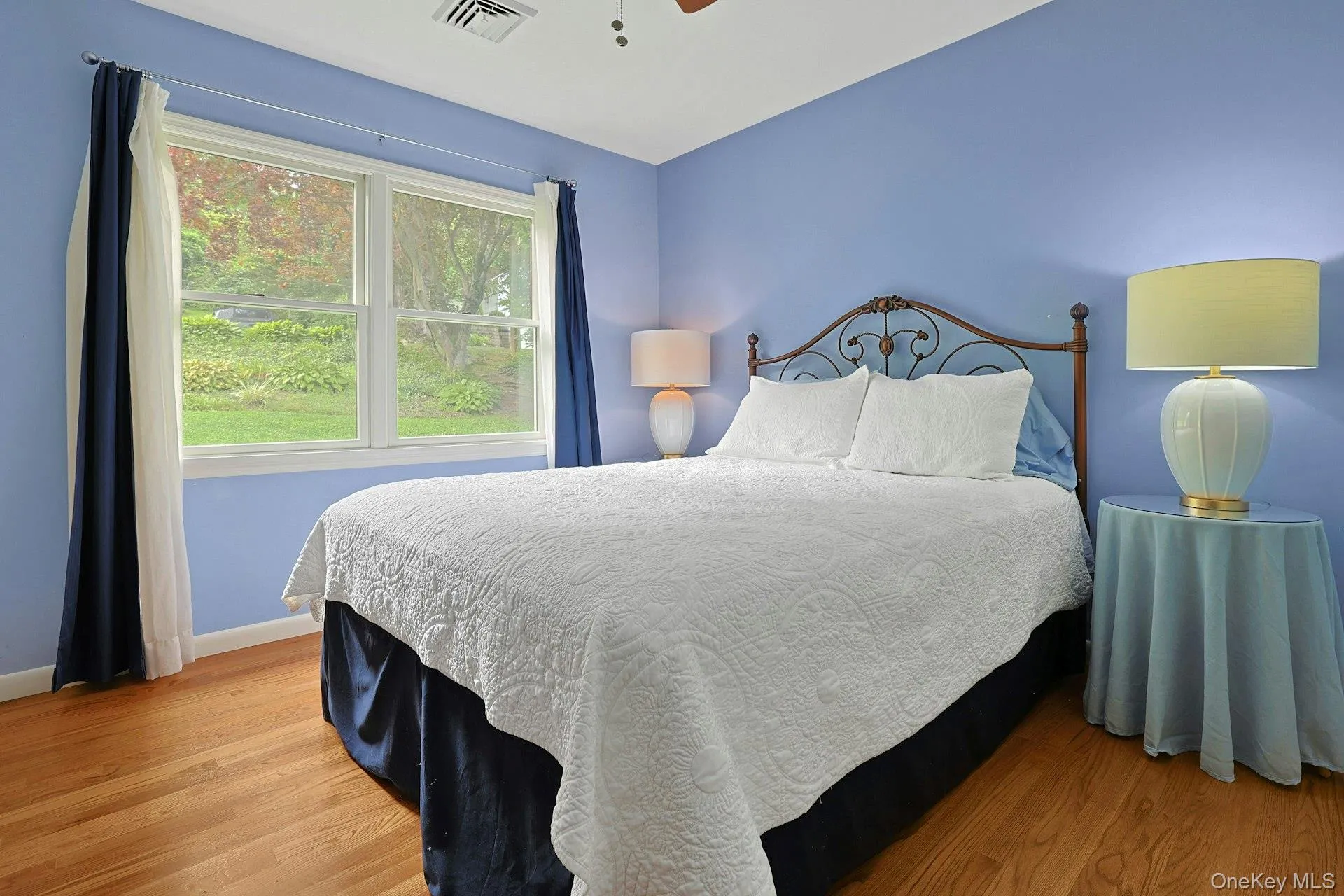 Bright and welcoming, the third bedroom provides a comfortable retreat for family and guests Bright and welcoming, the third bedroom provides a comfortable retreat for family and guests