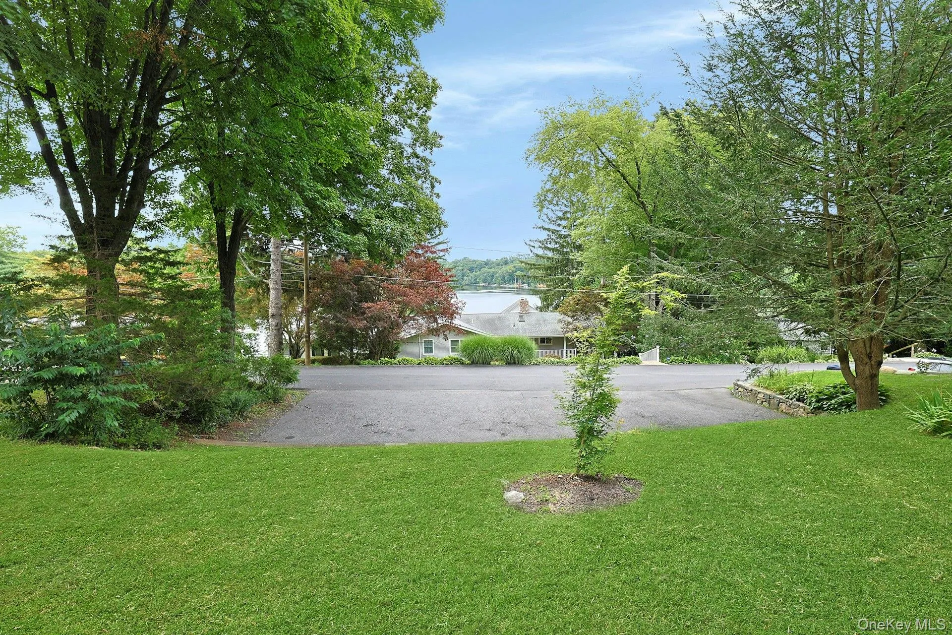 Generous parking for 6–10 vehicles, with additional buildable lot for a garage if desired Generous parking for 6–10 vehicles, with additional buildable lot for a garage if desired