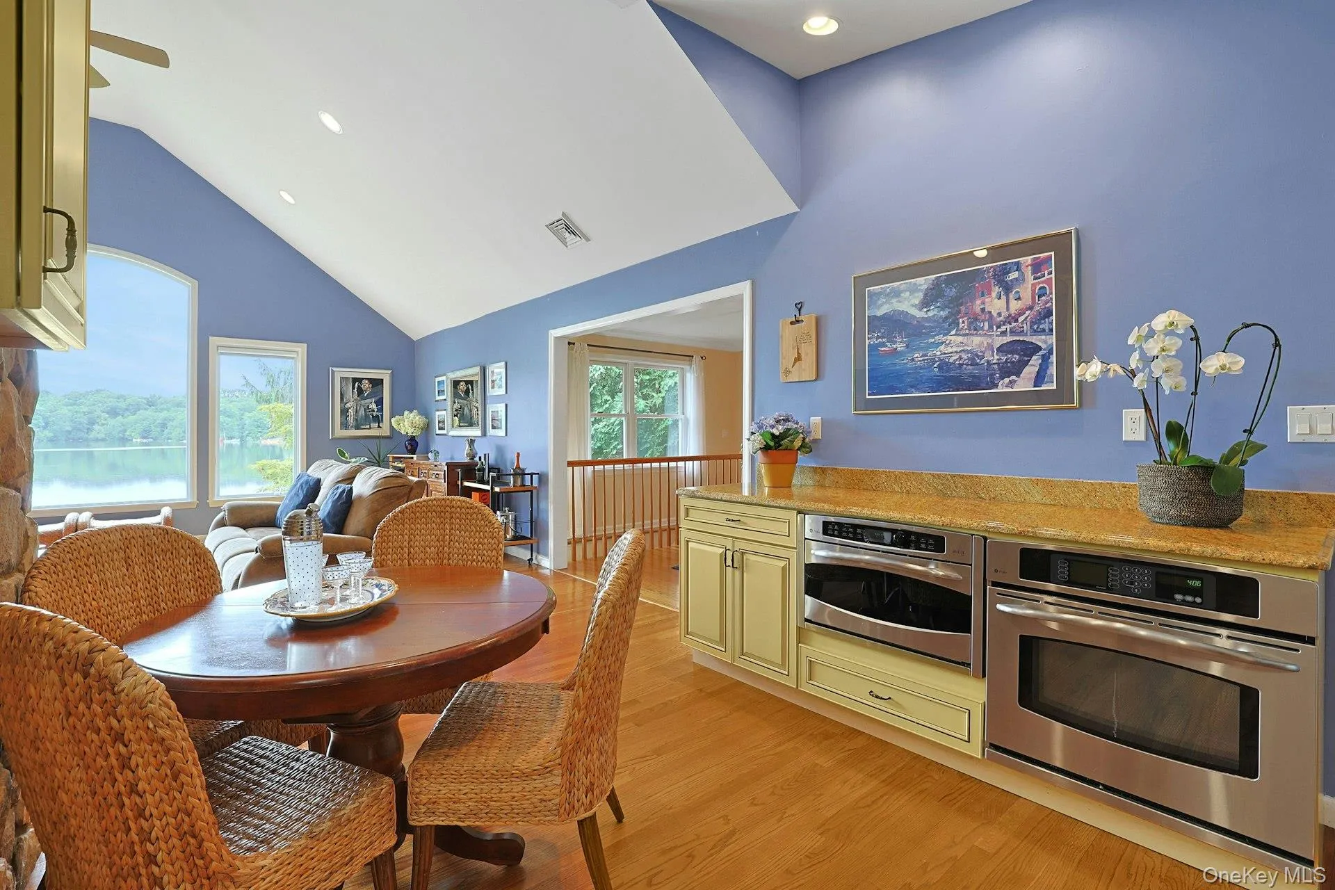 Enjoy every meal with a view. The eat-in kitchen table overlooks the lake, bringing peaceful ripples of light and magic to your everyday meals. Enjoy every meal with a view. The eat-in kitchen table overlooks the lake, bringing peaceful ripples of light and magic to your everyday meals.