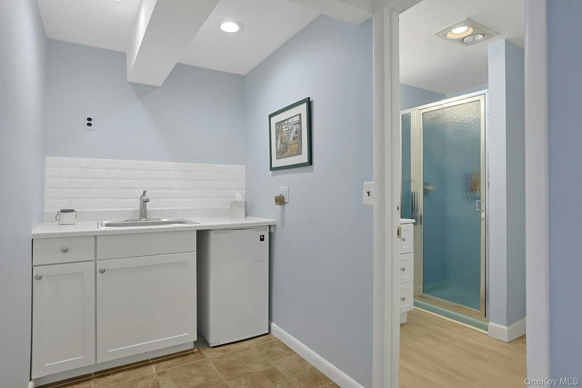 A full bathroom just off the family room adds comfort and convenience for everyday living. A full bathroom just off the family room adds comfort and convenience for everyday living.
