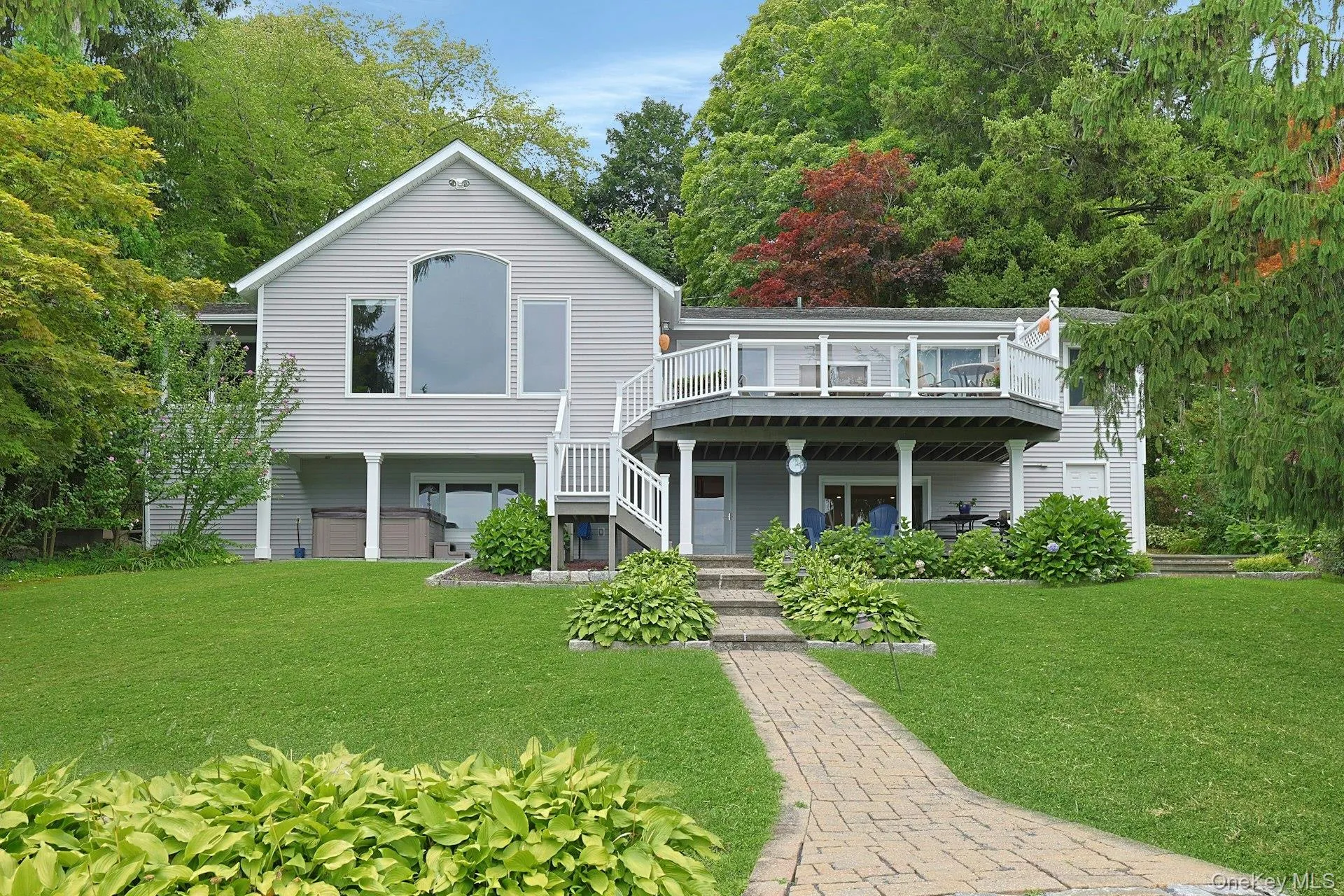 Multiple levels of outdoor living provide the perfect places to relax, entertain, and take in the breathtaking lake views from every angle. Multiple levels of outdoor living provide the perfect places to relax, entertain, and take in the breathtaking lake views from every angle.