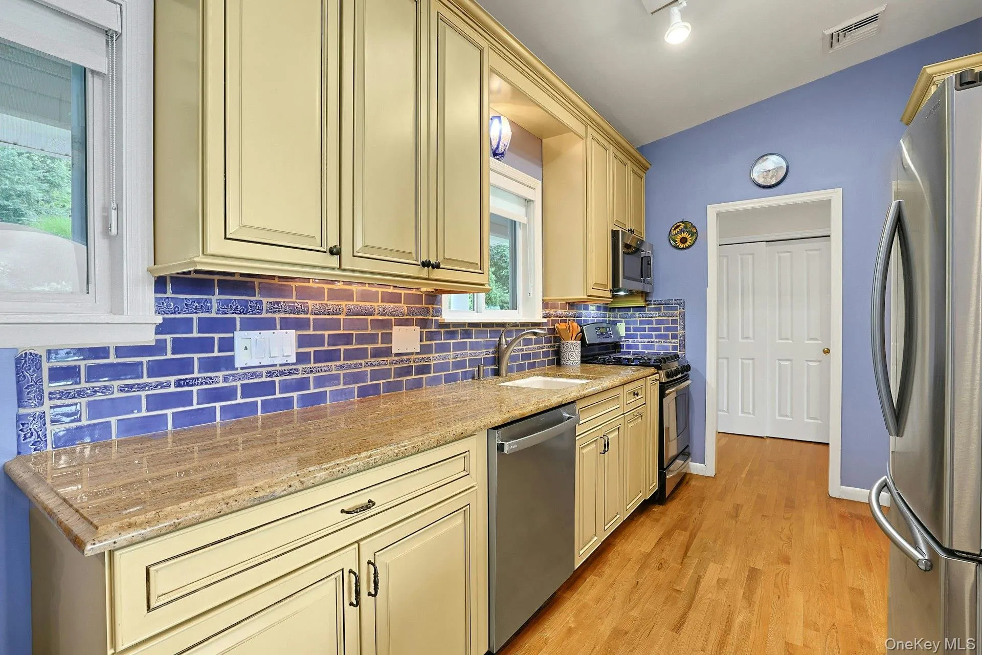 Custom tiles in kitchen made by Rosanne Breuer, Master Potter. Custom tiles in kitchen made by Rosanne Breuer, Master Potter.